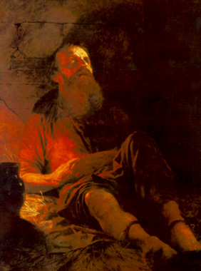 a man sitting against a prison wall