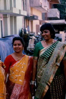 two Indian women dressed in saris